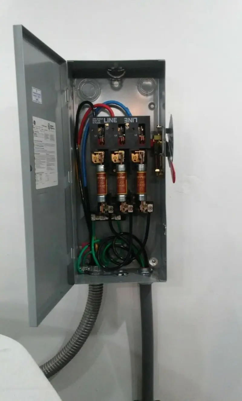Three-phase disconnect switch installed for Smoke Detector Installation in Dansville